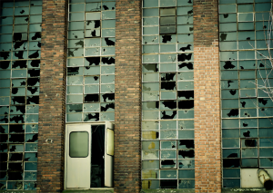 Broken windows in an old abandoned factory